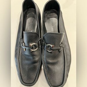 Mens Salvatore Ferragamo slip on loafers. Black with silver buckle.